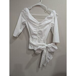 Pretty white cotton blouse by Zara woman size Medium w/bow/sash detail